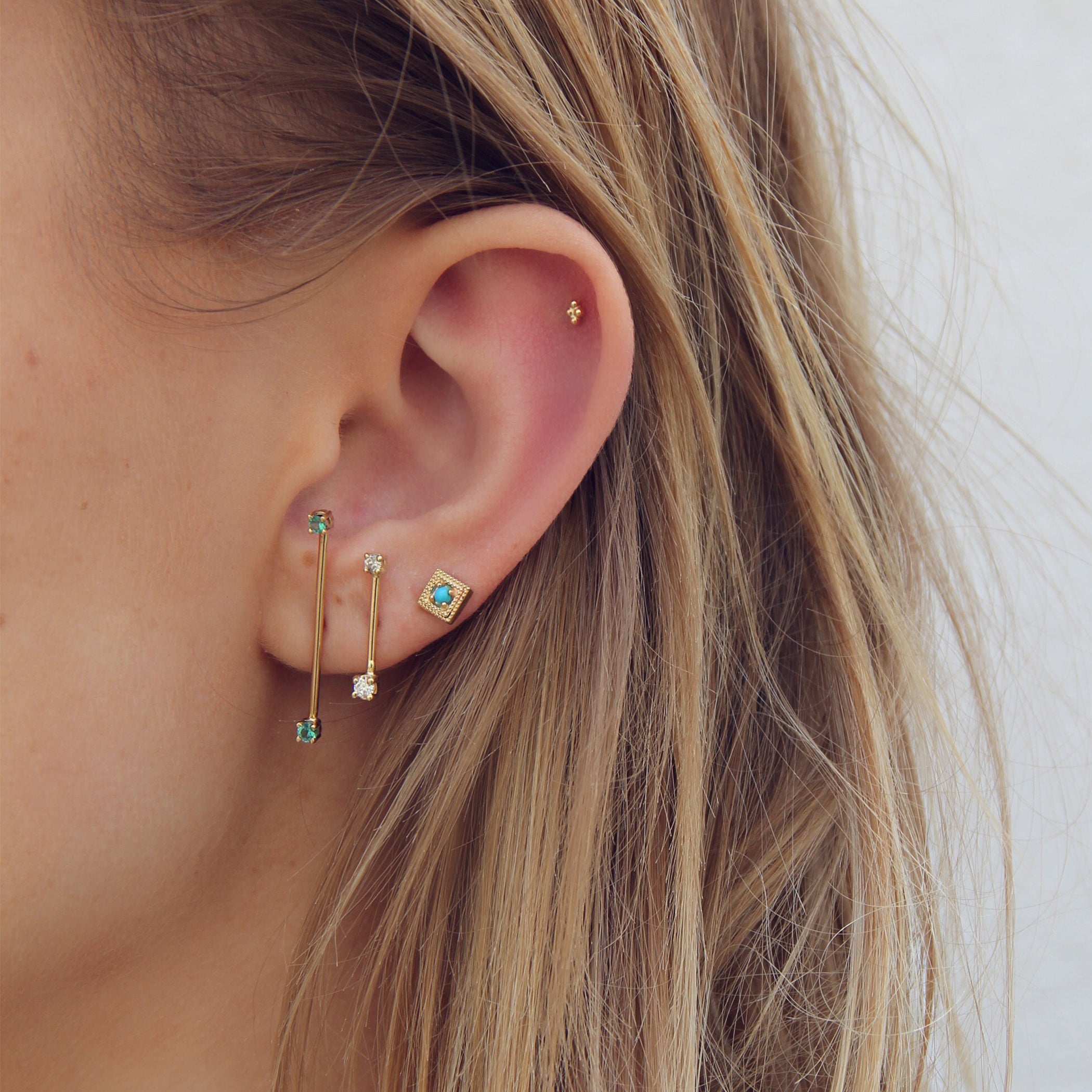 LONG STAPLE WITH EMERALDS STUDS